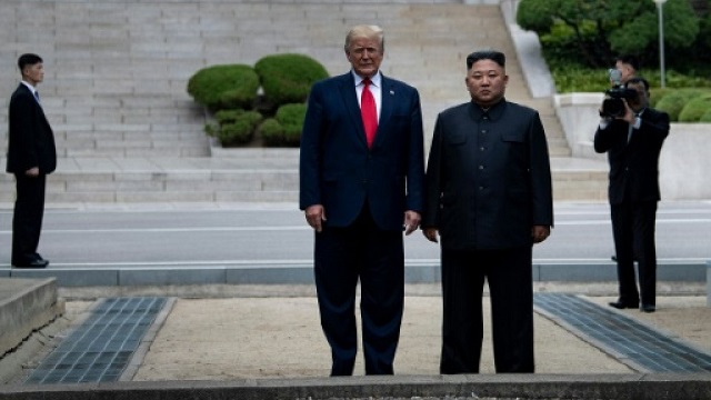 trump and north korea 039 s leader kim jong un stand on north korean soil while walking to south korea in the demilitarized zone dmz on june 30 2019 in panmunjom korea photo afp