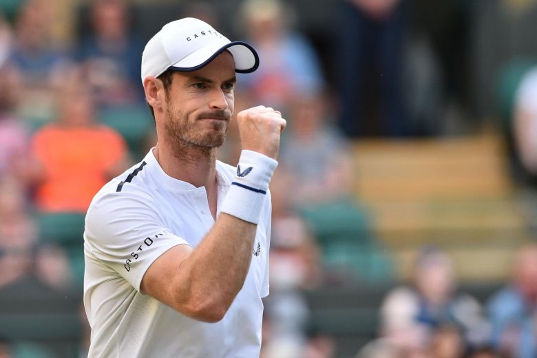 murray a two time wimbledon singles champion partnered france 039 s pierre hugues herbert to a four set win in their first round doubles match photo afp