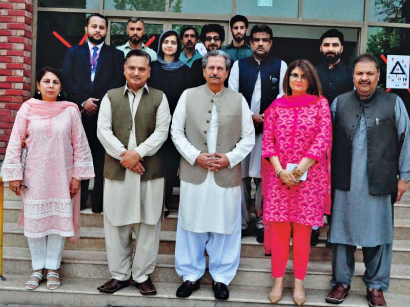 minister for education and professional training shafqat mehmood with comsats faculty photo express