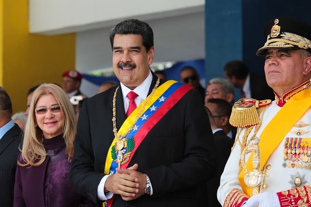 venezuela 039 s president and defense minister during a military parade on independence day photo afp