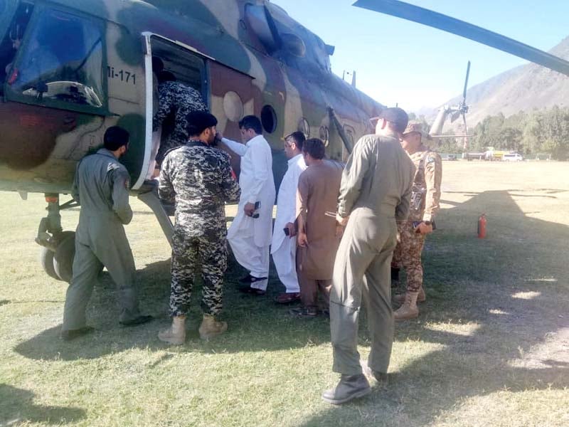 army personnel evacuate stranded people in a helicopter in chitral photo express