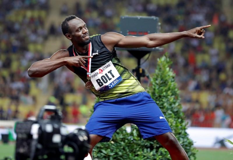 bolt who won eight olympic gold medals and led jamaica through a golden era in sprinting photo afp