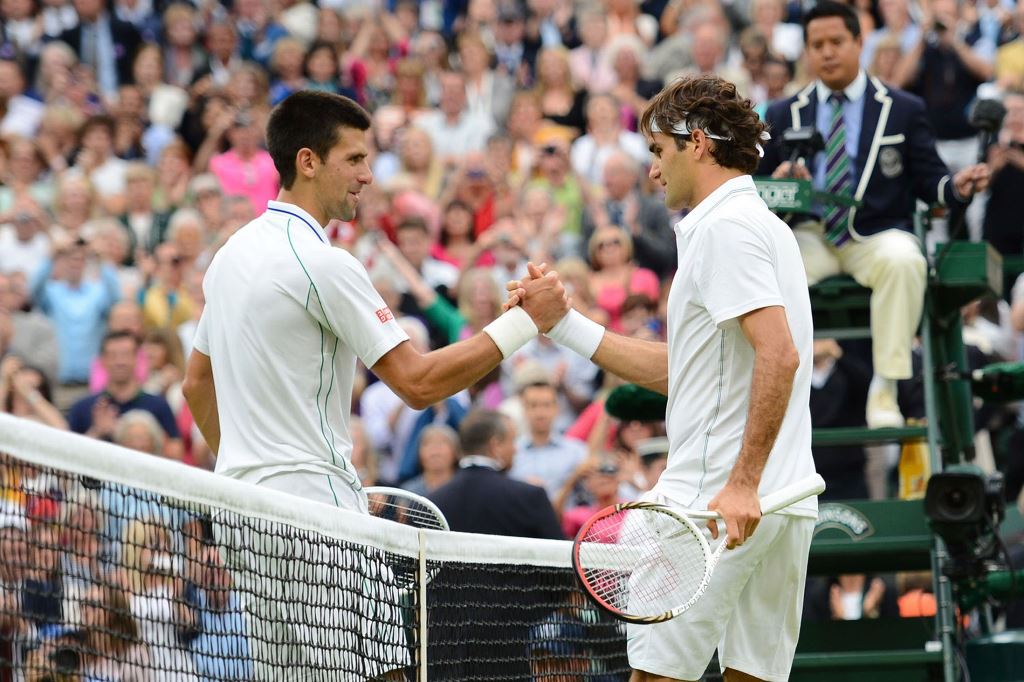 head to head lead four time wimbledon winner and defending champion djokovic enjoys a 25 22 edge in career meetings against federer photo afp