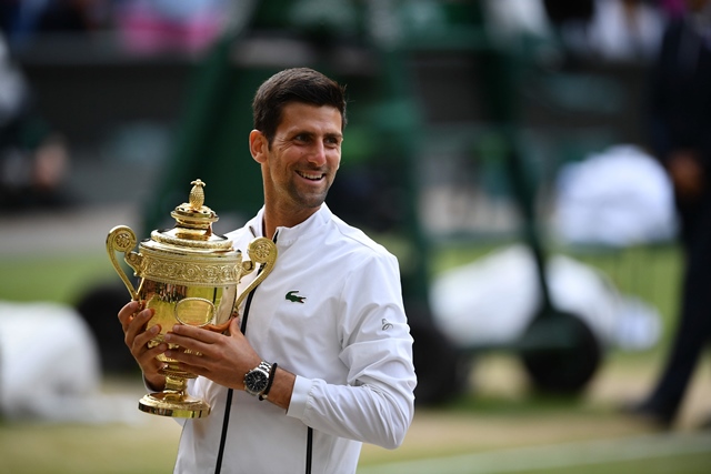 newspapers stressed that the world number who is now level on five wimbledon titles with bjorn borg is the first man in 70 years to win the title after recovering from two match points down photo afp