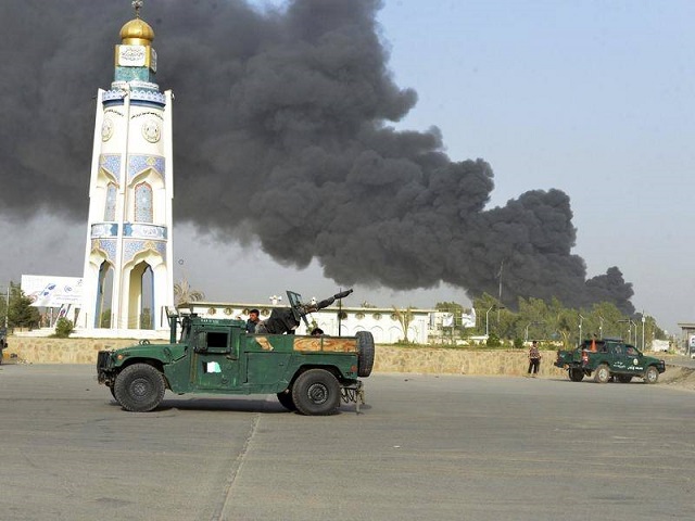 at least 80 injured as taliban fighters detonate two car bombs at the gate of the premises photo afp