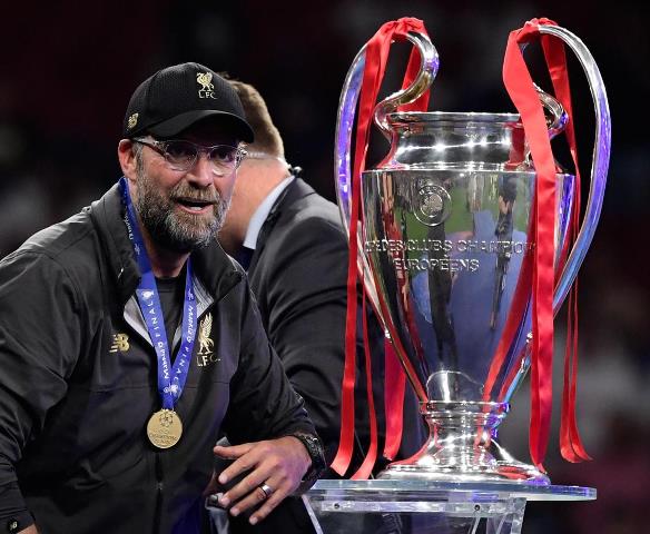 klopp meanwhile said liverpool were girding themselves for another daunting title chase with manchester city who pipped them to the premier league crown on the final day of the season photo afp