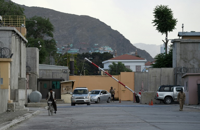 a labyrinth of concrete blast walls spotlights and checkpoints are eating up ever more of kabul standing in stark contrast to a similar area in iraq 039 s baghdad where easing tensions have seen its barricades come down photo afp