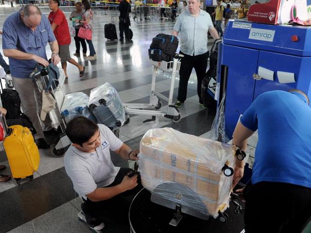 plastic wrapping of luggage made mandatory at all airports