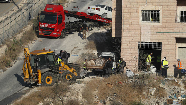 israeli security forces demolish palestinian homes in wadi al hummus area next to the palestinian village of sur baher in east jerusalem on july 22 2019 photo afp