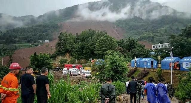 dozens are missing after heavy rains triggered a landslide in china 039 s southwestern guizhou province photo afp