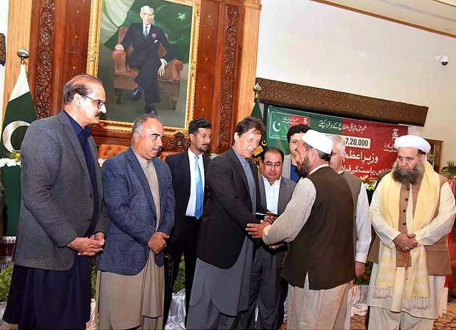 prime minister imran khan distributes health card to people of tribal districts photo app