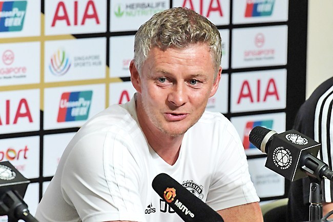 the norwegian solskjaer under pressure to prove that he is the man to take united back into the champions league named a strong side that included wantaway midfielder paul pogba and new signings daniel james and aaron wan bissaka photo afp