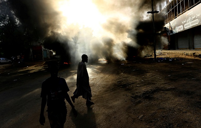 protesters burn tyres during a demonstration against a report of the attorney general on the dissolution of the sit in protest in khartoum sudan photo reuters