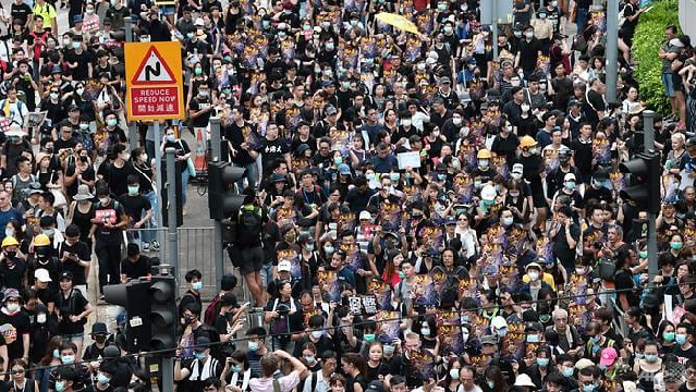 Hong Kong Protesters Defy Police Ban And March Again