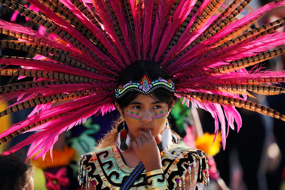 A young traditional Aztecs -Chichimeca dancer take part in a 