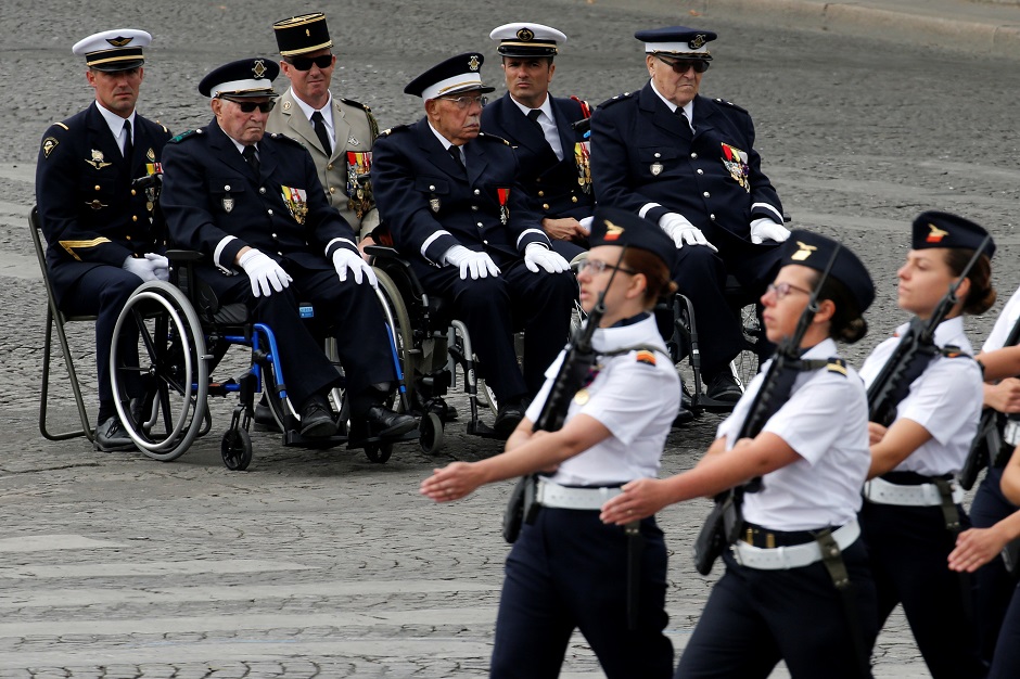 Veterans take part in the traditional Bastille Day military parade on the Champs-Elysees Avenue in Paris, France: REUTERS