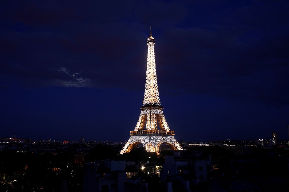 The Eiffel Tower is illuminated before the traditional Bastille Day fireworks display in Paris, France: REUTERS