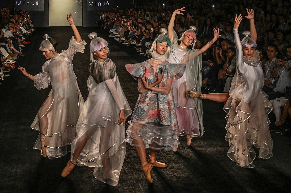 Models present creations by Fashion Design students from the Pontificia Bolivariana University . PHOTO: AFP
