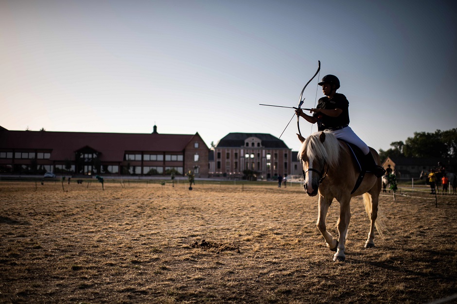 A man takes part in an archery on horseback competition in Lamotte-Beuvron, south of Paris. PHOTO: AFP