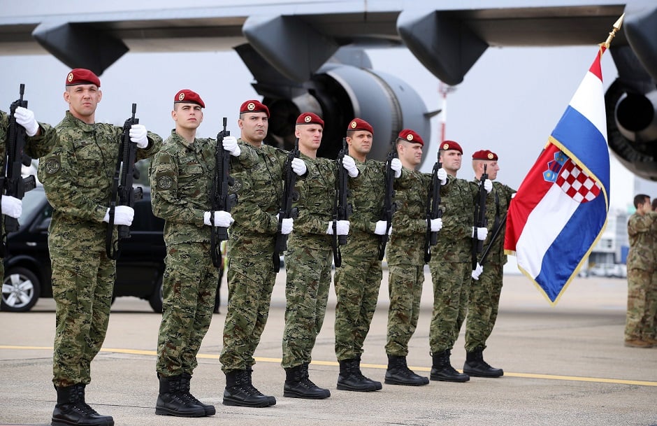 Croatian soldiers stand guard as the coffin of Josip Briski, the Croatian soldier killed in a terrorist attack in Kabul. PHOTO: AFP