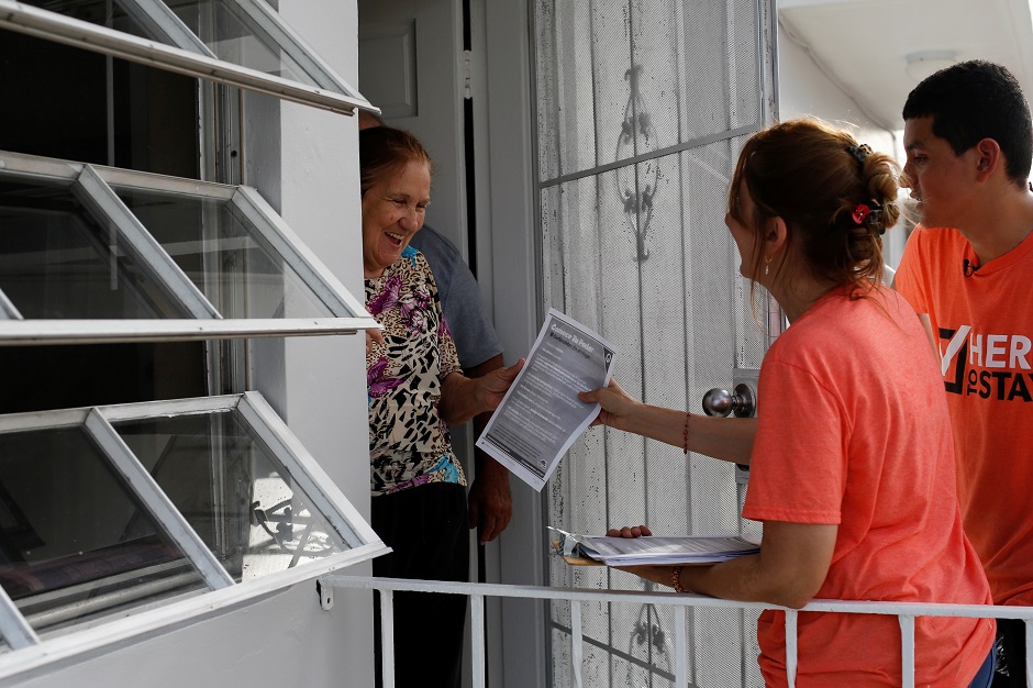 Immigration rights activists hand out pamphlets as communities braced for a reported wave of deportation raids across the United States by Immigration and Customs Enforcement officers, in Miami. PHOTO: AFP