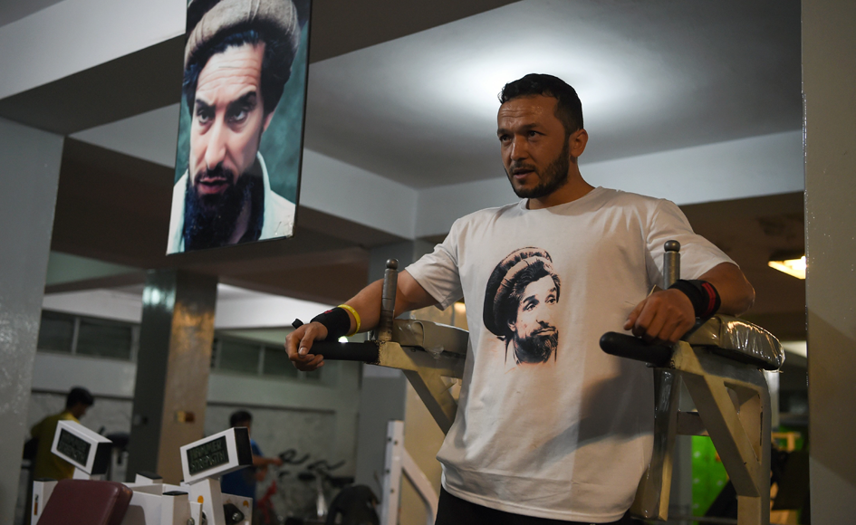 A bodybuilder wears a T-shirt with a portrait of Ahmad Shah Massoud,  at a gym in Kabul. Photo: AFP