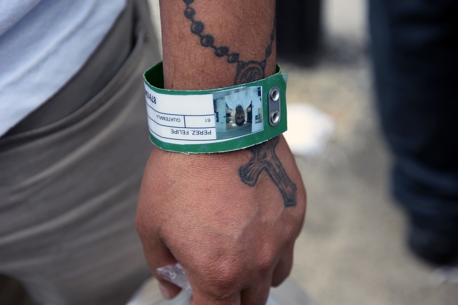 View of a Guatemalan migrant's wristband upon his arrival at the Air Force Base in Guatemala City after being deported from the United States. PHOTO: Reuters