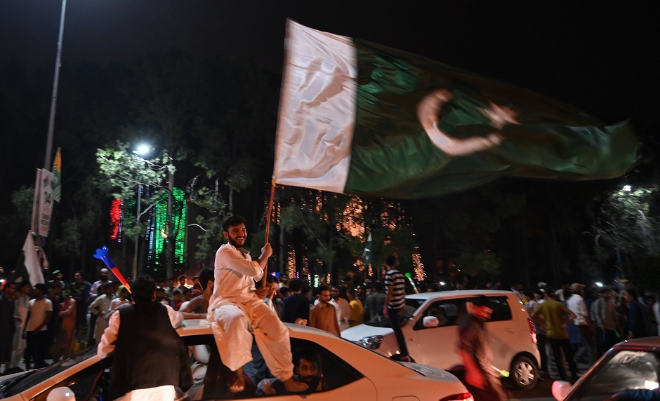 Pakistanis take to the streets during Independence Day celebrations in Islamabad. (Photo: Aamir Qureshi / AFP)