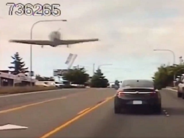 Image result for Watch plane make emergency landing on busy street