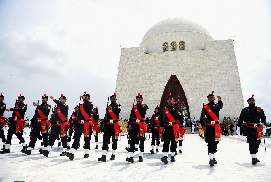 Pakistani police with the Special Security Unit (SSU) march in front of the mausoleum of founding father Quaid-e-Azam Mohammad Ali Jinnah during Independence Day celebrations in Karachi. (Photo: Rizwan Tabassum / AFP)