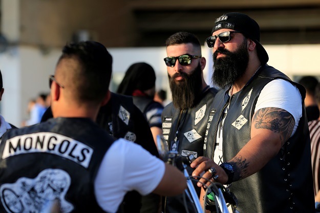 Members of the Iraq Bikers are seen during a car and motorbike show outside the closed Hall of Shaab Stadium in Baghdad. PHOTO: REUTERS