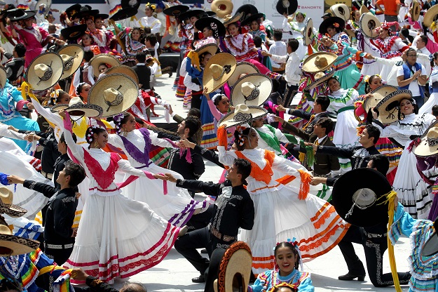 Couples dance to Mariachi traditional music. PHOTO: AFP