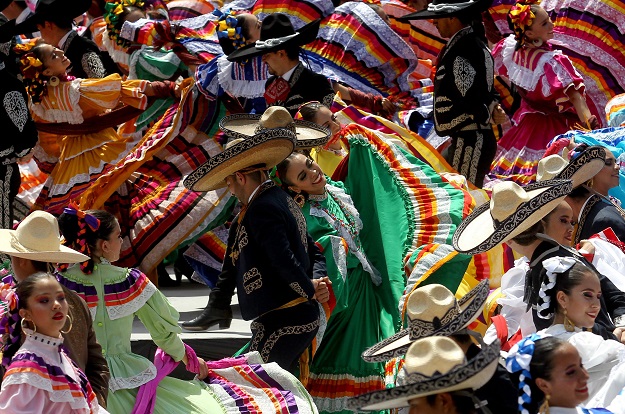 Couples dance to Mariachi music. PHOTO: AFP