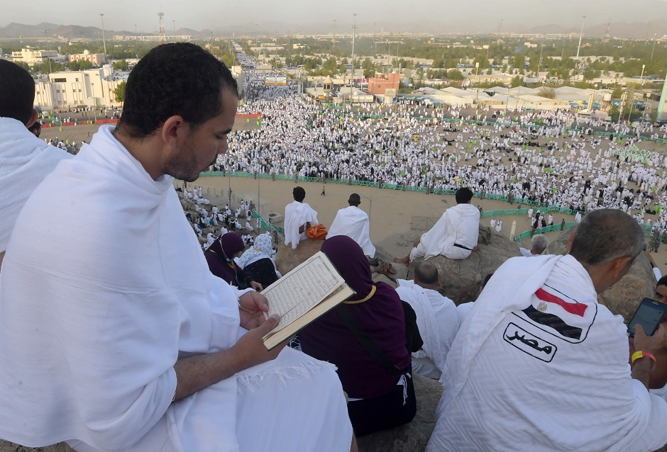 Muslim pilgrims pray at Mount Arafat, also known as Jabal al-Rahma (Mount of Mercy), southeast of the Saudi holy city of Mecca, as the climax of the Hajj pilgrimage approaches on August 10, 2019. PHOTO: AFP