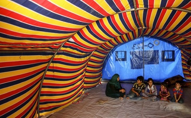 Nihaya Issa, 33, and her family live in Iraq's sprawling Khazer refugee camp (Photo: AFP)