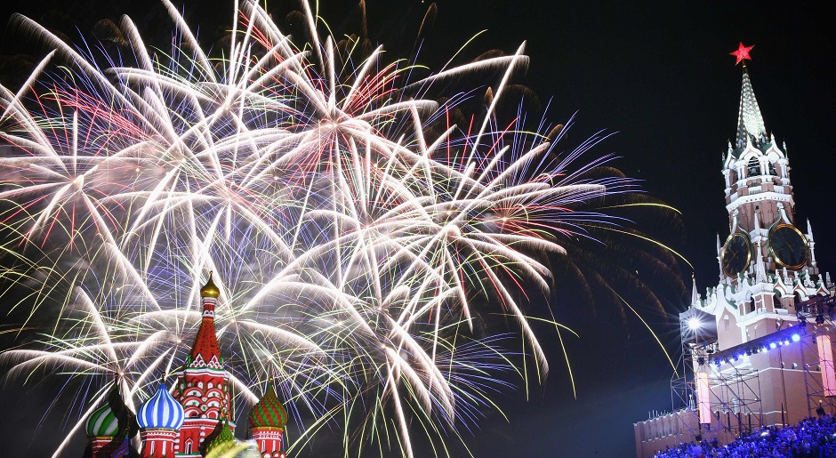 Fireworks burst over Saint Basil's Cathedral during the 