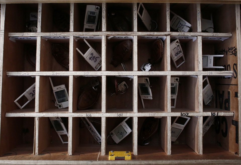 Room keys are pictured at a reception desk of an empty hotel. (PHOTO: REUTERS)