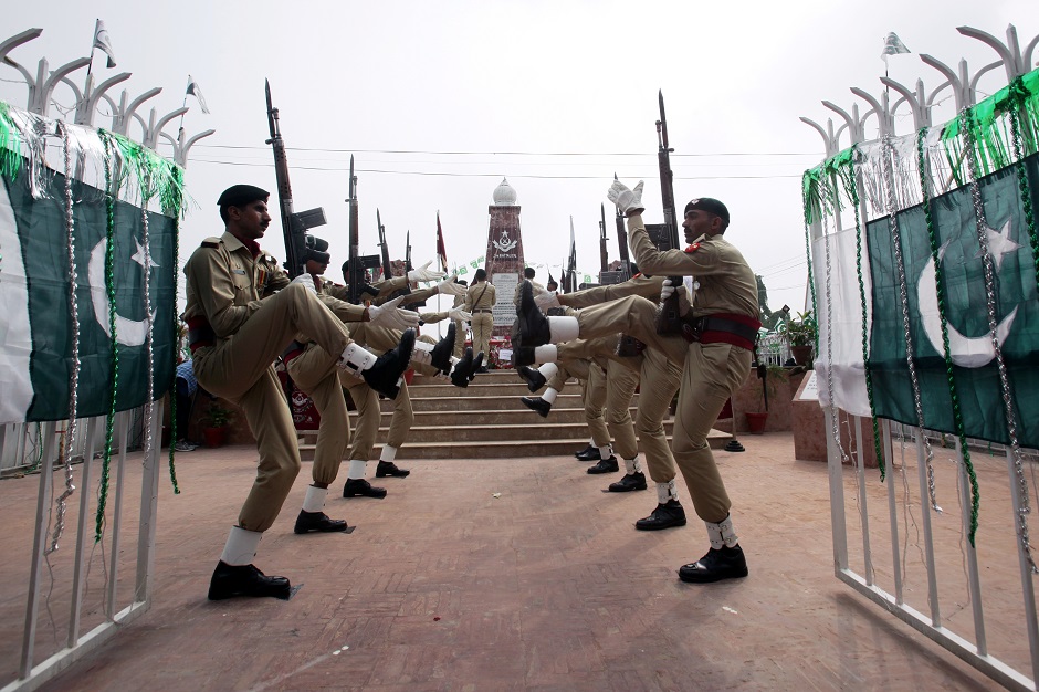  Army honor guards pay tribute at the war monument, during Defence Day ceremonies, or Pakistan's Memorial Day, to express solidarity with the people of Kashmir, at Wagah border, near Lahore. PHOTO: Reuters
