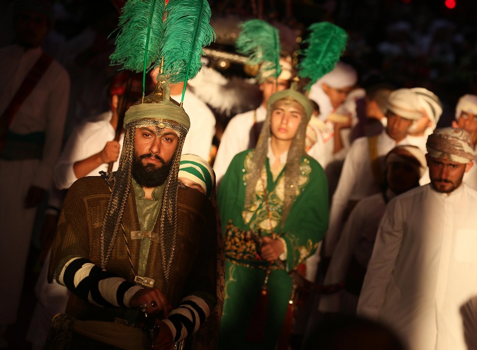 Iraqi Shiites in costumes re-enact events of Ashura in the central city of Karbala. PHOTO: AFP