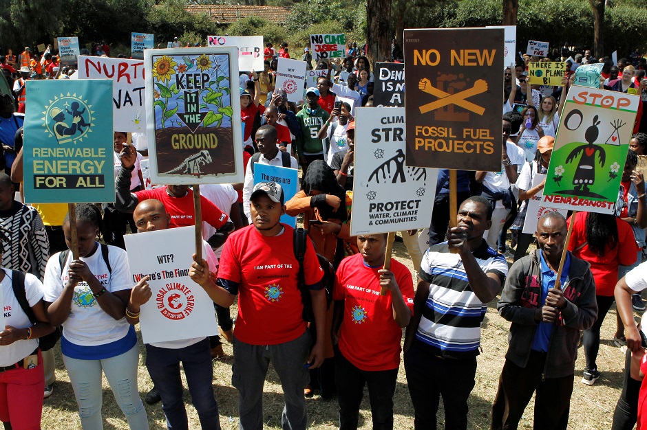 Environmental activists march carrying signs take part in the Climate strike protest calling for action on climate change, in Nairobi, Kenya. PHOTO: Reuters