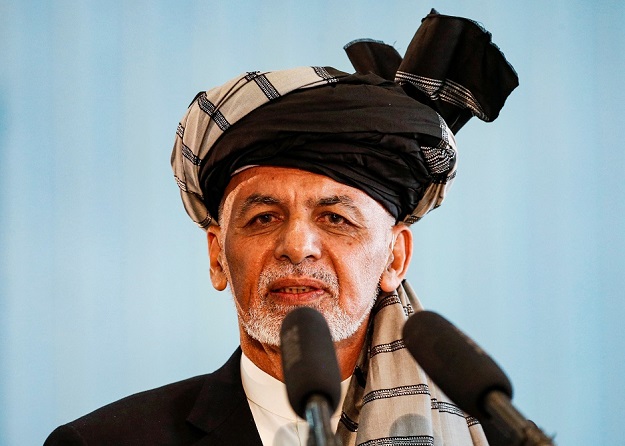  Afghan presidential candidate Ashraf Ghani speaks after casting his vote in the presidential election in Kabul, Afghanistan. PHOTO: Reuters