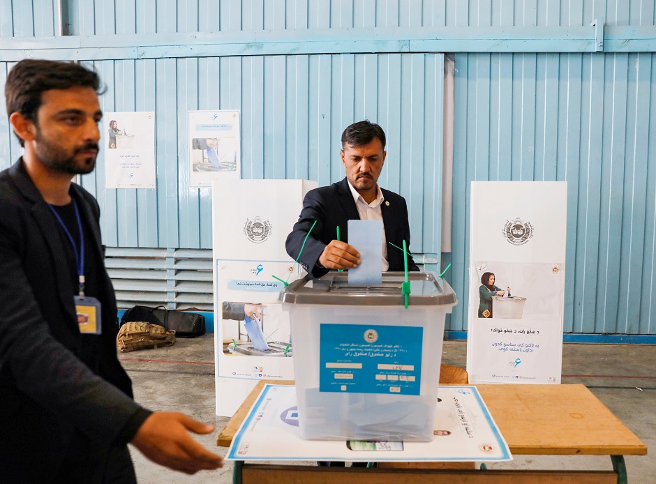 An Afghan man casts his vote in the presidential election in Kabul. PHOTO: Reuters 