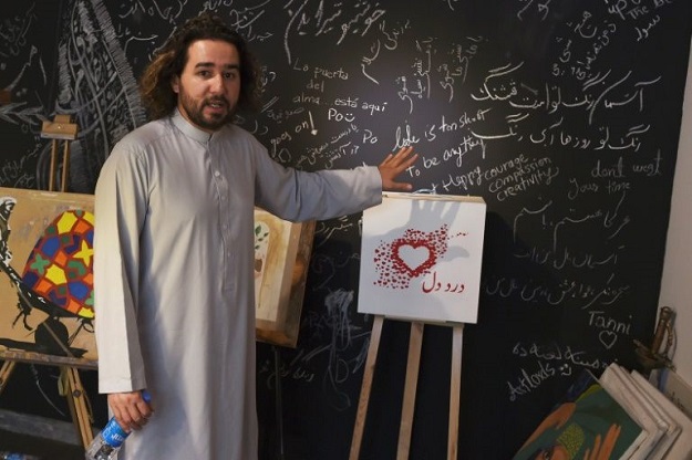 Afghan co-founder and president of ArtLords Omaid Sharifi is building on the Afghan tradition of penning 'dard-e-dil' - letters of pain (Photo: AFP)
