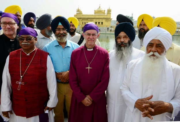 Welby visited the Sikh Golden Temple in Amritsar. PHOTO: AFP.