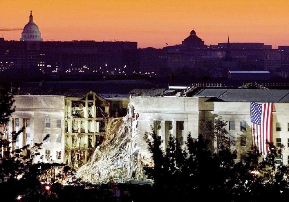 The damaged area of the Pentagon building, where a commercial jetliner slammed into it September 11, is seen in the early morning at sunrise with the US Capitol Building in the background. PHOTO: Reuters 