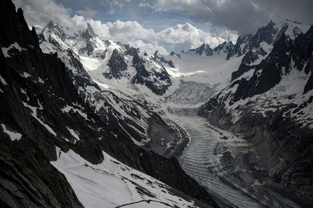 Visitors arriving from the last tramstop before the 4,809-metre summit of Mont Blanc are forced to take 20 steps more each year to reach the retreating Mer de Glace glacier, France's largest. PHOTO: AFP