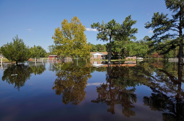 A home is surrounded by flood waters in the aftermath of Hurricane Dorian. PHOTO: Reuters