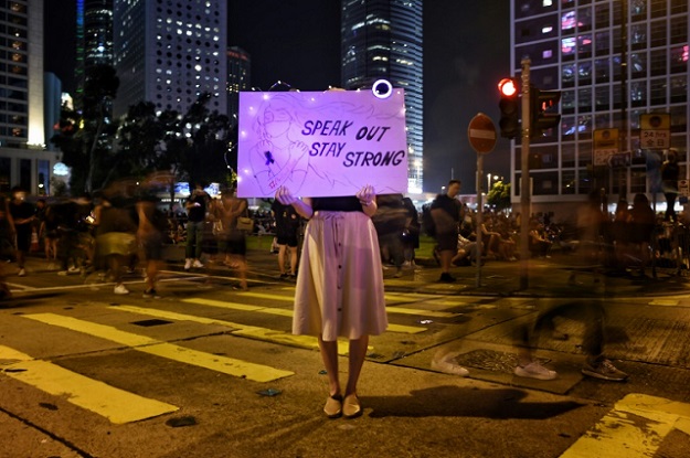 Female protesters posting support for the pro-democracy movement said they have experienced a slew of sexist online attacks in response. (Photo: AFP)