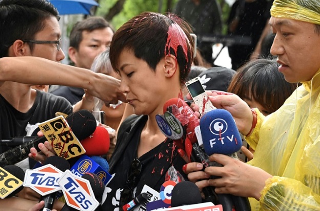 Hong Kong democract activist Denise Ho was attacked with red paint in Taipei. PHOTO: AFP