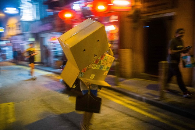 watch clashes as hong kong protesters don halloween masks